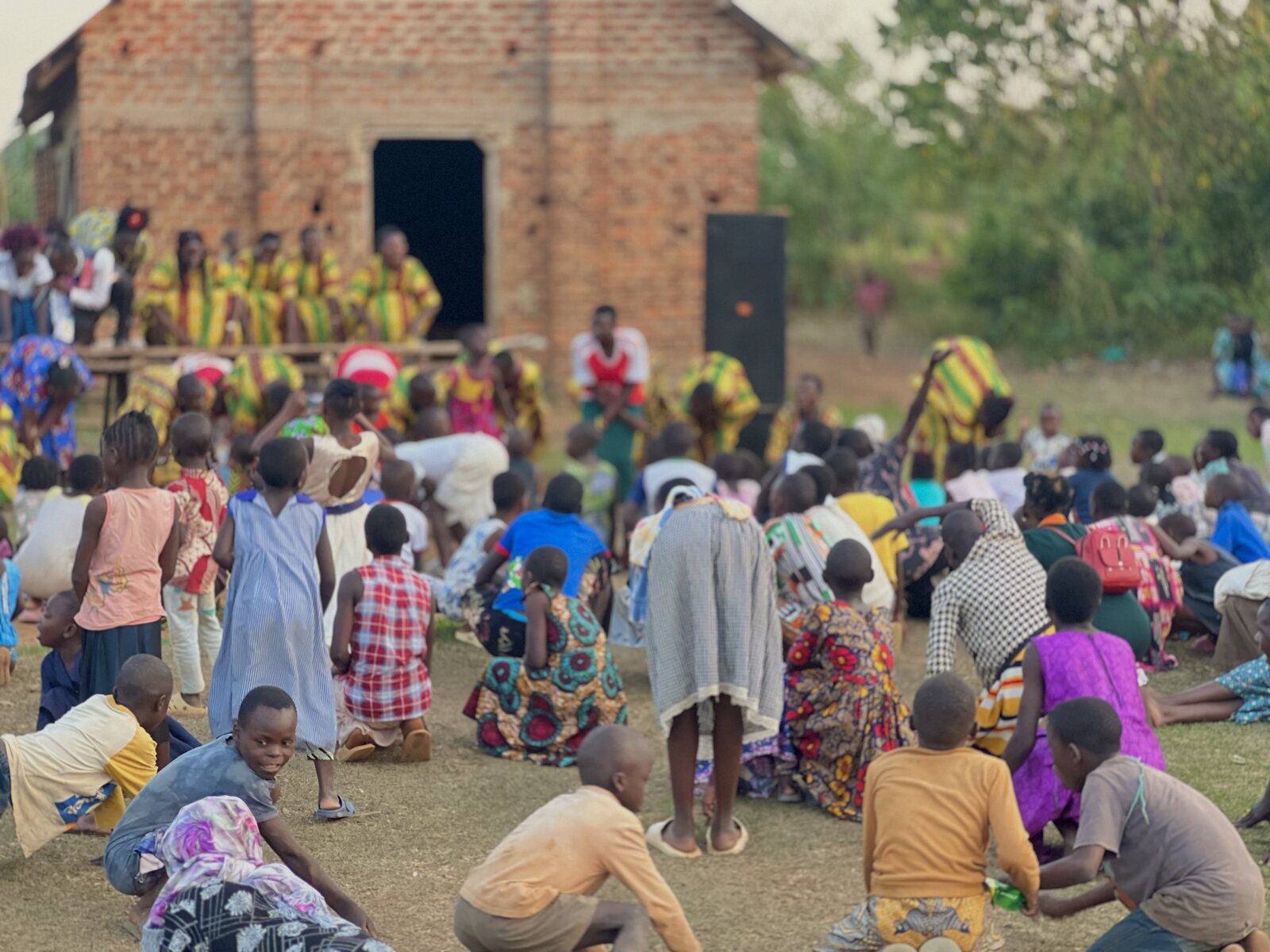 Open-air gathering at dusk